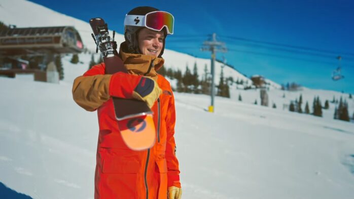 Professional Snowboarder With Gear